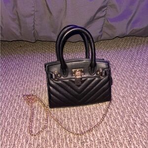 Black and gold textured crossbody purse